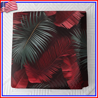 Couvre-lit rouge et vert à motif de feuilles tropicales