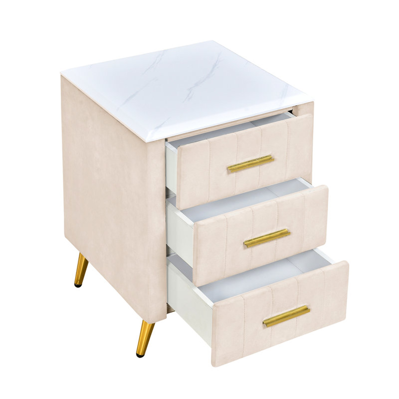 Table de chevet rembourrée avec 3 tiroirs et détails en métal - Beige Essence Decor