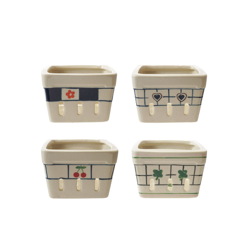 Ensemble de paniers en baies de grès peintes à la main