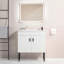 Meuble-lavabo 24 po avec pieds en métal et lavabo en céramique blanche