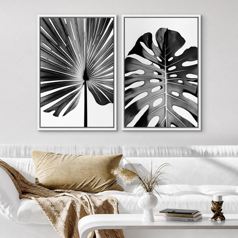 Reproduction de feuilles tropicales noires et blanches Monstera Jungle, H 36 po x l 48 po x P 1,5 po, Cadre flottant blanc