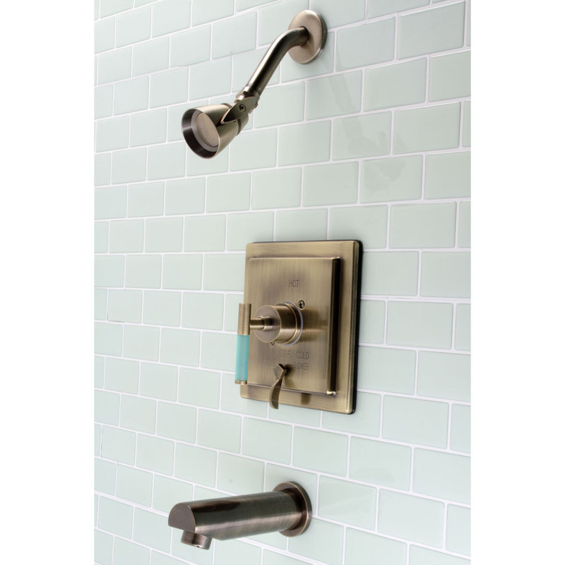 Robinet de baignoire et douche à pression équilibrée à poignée simple Kingston Brass Kaiser, Laiton antique