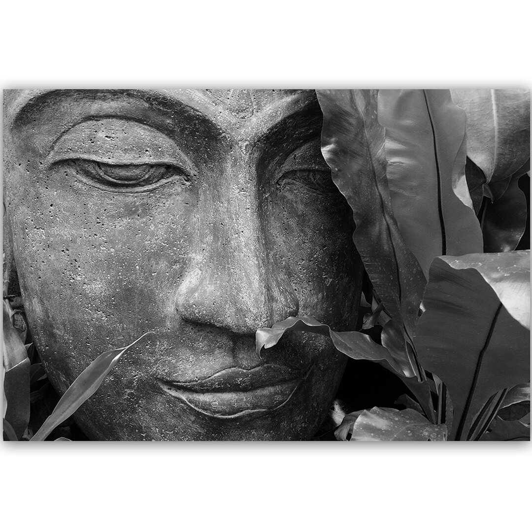 Leinwandbild Gesicht des Buddha mit Laub 3