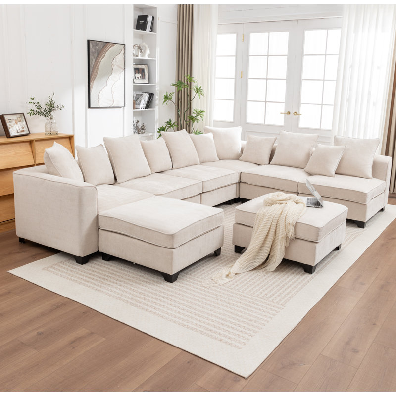 Canapé modulaire rembourré en U avec deux repose-pieds Kempson, Polyester beige