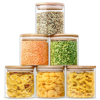 The Glass Jar Is Attached With A Bamboo Lid