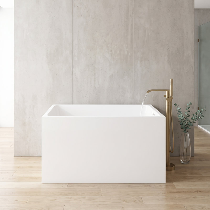 Baignoire autoportante rectangulaire moderne en acrylique blanc brillant, 109 x 71 cm, avec trop-plein chromé et bonde escamotable.