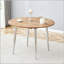 Table de salle à manger extensible ronde avec panneau de fibres à densité moyenne à grain de bois et pieds argentés