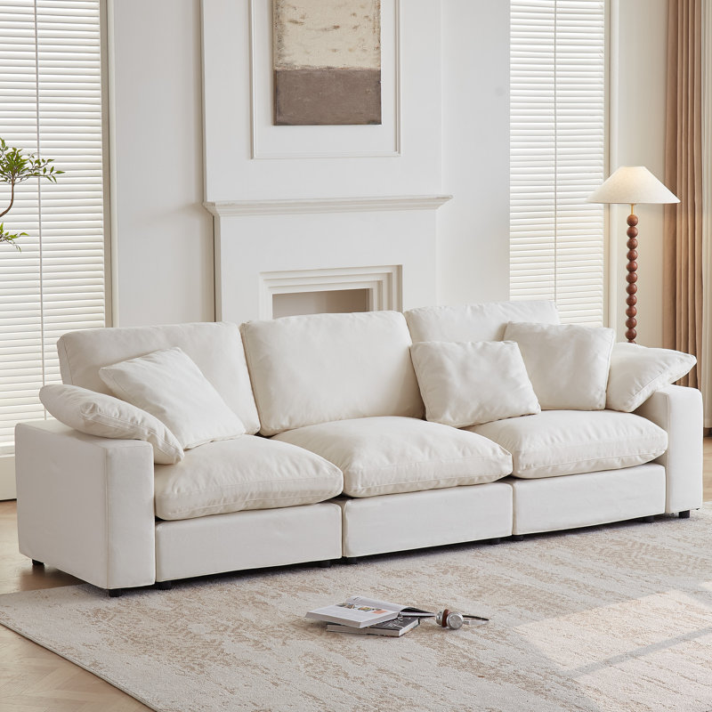 Canapé d'angle modulaire Cloud Couch, confort optimal. Sans compression sous vide. Garnissage en duvet et coton. Housses lavables - 3 places, blanc cassé.