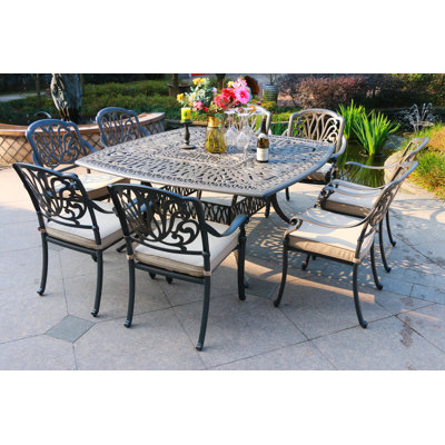 Annecorinne 8 - Person Patio Dining Set with Rectangular Table , Cushions Included
