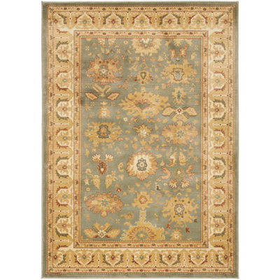 Nellwyn Area Rug In Blue / Creme