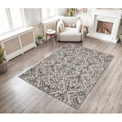 Tapis décoratif abstrait gris géométrique abitton