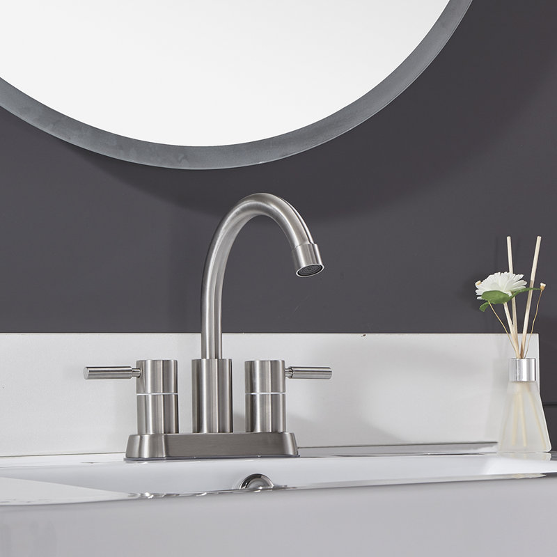 Robinet de salle de bain central à 2 poignées avec bonde