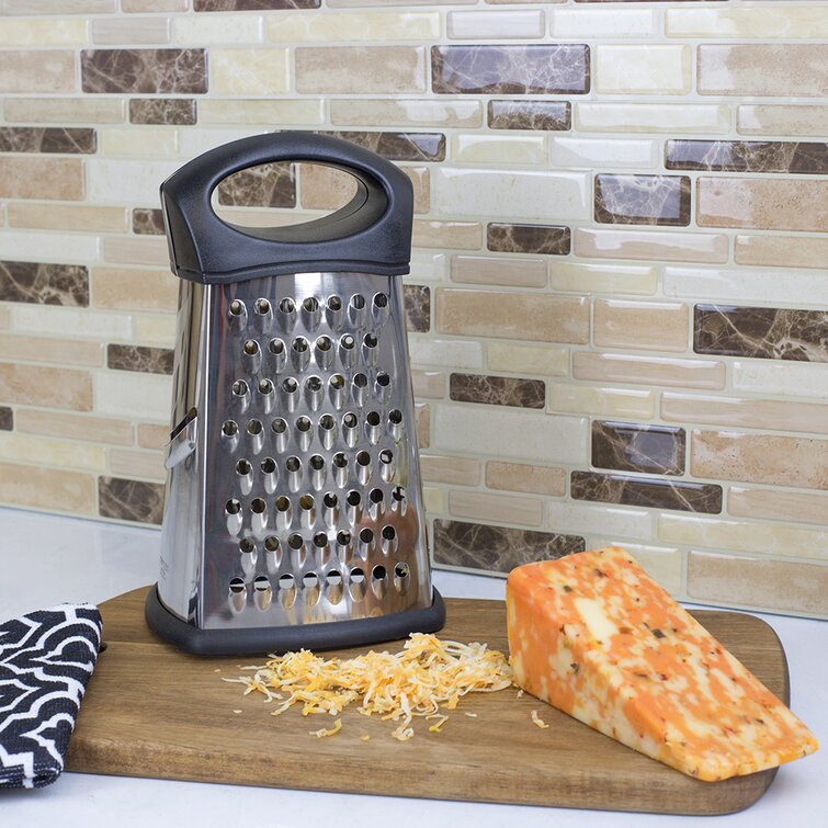 https://assets.wfcdn.com/im/25462311/resize-h755-w755%5Ecompr-r85/9237/92372937/Debbie+Stainless+Steel+Cheese+Grater+with+Storage+Container.jpg