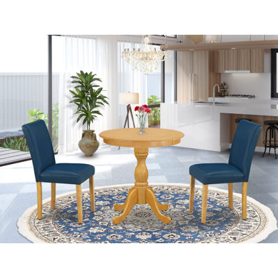 3 Piece Dining Room Set Contains a Round Dining Table with Pedestal and 2 Oasis Blue Faux Leather Upholstered Chairs, Oak