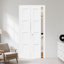 Porte pliante en bois manufacturé blanc à 4 panneaux avec base en bois massif apprêté blanc avec trousse de quincaillerie d'installation
