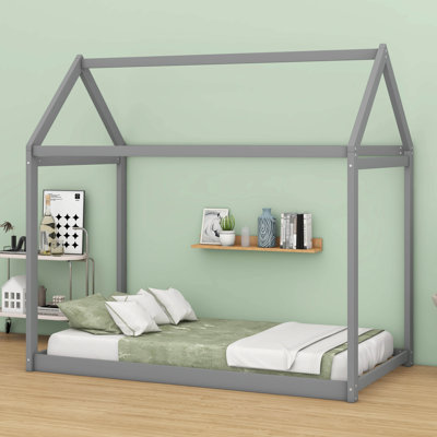 Lit simple en forme de maison au sol, structure de lit basse en bois massif avec toit