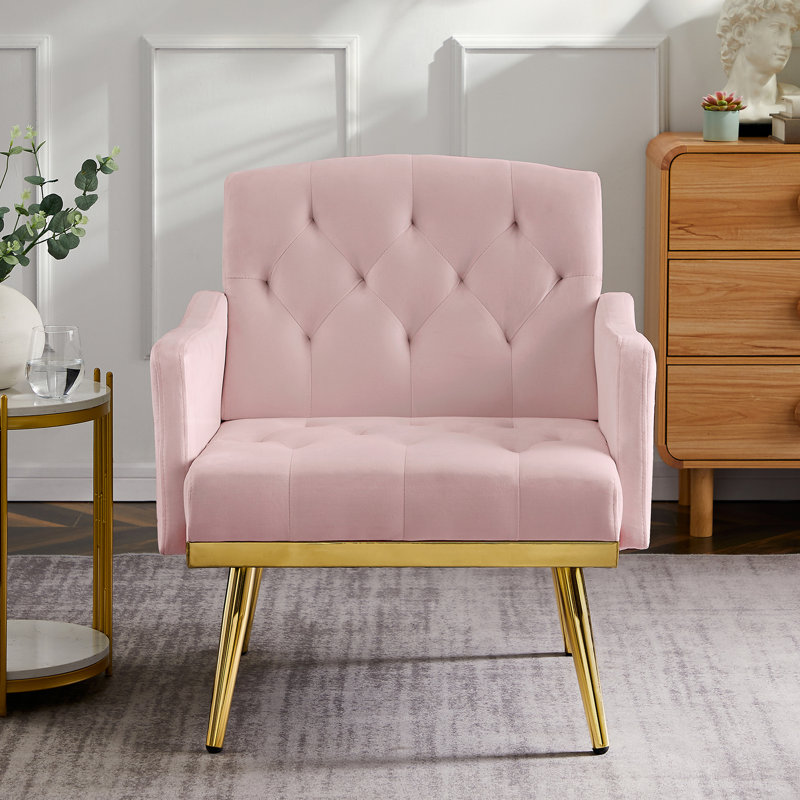 Fauteuil confortable en velours rose avec pieds en métal doré - profitez d'un siège confortable