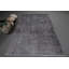 Tapis noir de style turc fabriqué à la main, parfait pour ajouter de l'élégance à votre décor de salon