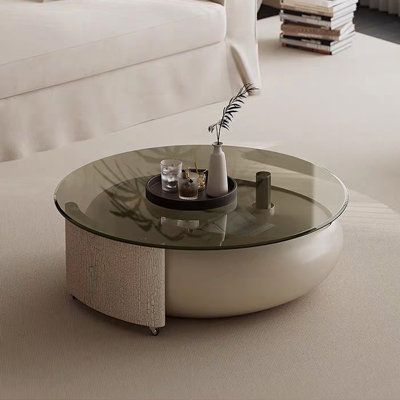 360° Rotating Round Coffee Table with Tempered Glass Top, Lockable Caster Wheels, Luxury Modern Living Room Table in Cream White
