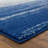 Rifiki Abstract Blue/Cream Area Rug-582808934