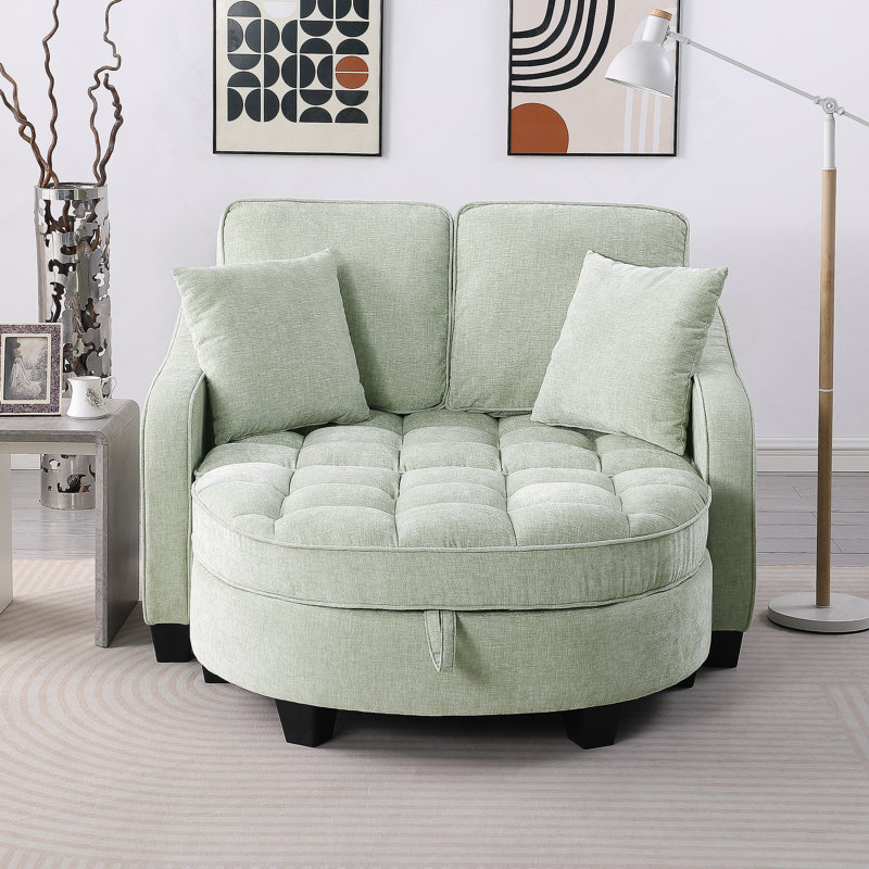 Canapé cyan deux places avec méridienne, accoudoirs irréguliers, repose-pieds de rangement et coussins décoratifs pour le salon et la chambre à coucher