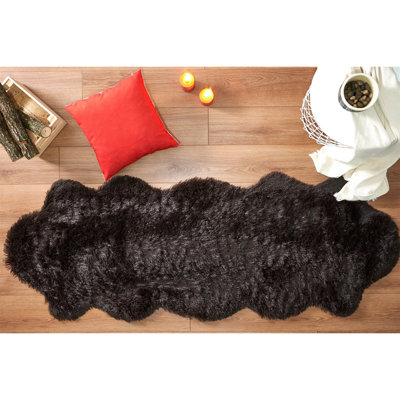 Tapis noir en acrylique tissé à plat de couleur unie Novelty Kelling