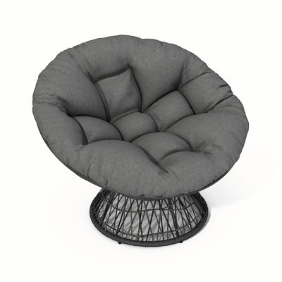 Fauteuil ergonomique en osier avec coussins en tissu épais