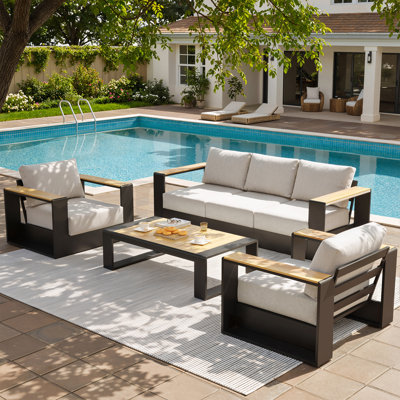 Ensemble de conversation extérieur en aluminium 4 pièces avec coussins en tissu oléfine, ensemble de meubles de patio comprenant un canapé 3 places, 2 fauteuils individuels et une table basse.