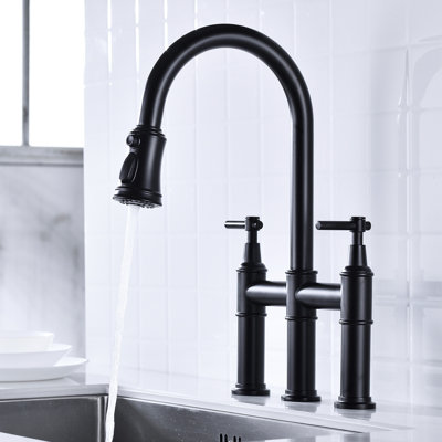 Robinet de cuisine rétractable noir mat - Deux poignées pour une régulation précise de la température et du débit.