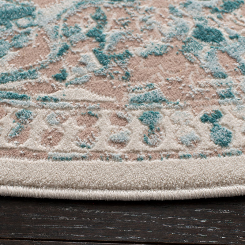 Tapis oriental turquoise / ivoire Alston, Rond 6 pi 7 po
