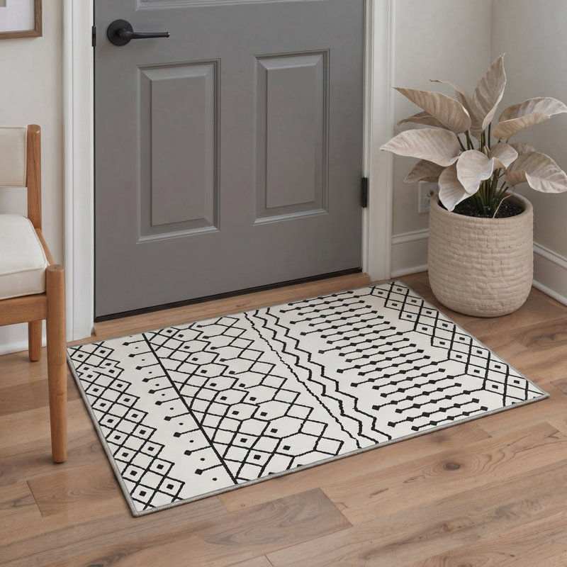 Tapis zigara à motif géométrique blanc et noir lavable à la machine avec envers antidérapant Abrahamson