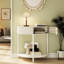 Table d'appoint à motif ondulé, rangement double, finition beige vanille crémeuse, idéale pour une entrée ou une chambre. Tiroirs à détails ondulés blancs.