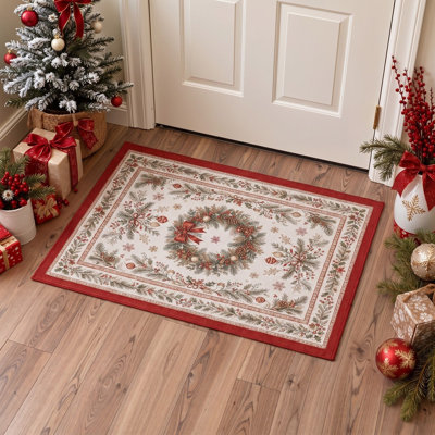 Tapis de salon lavable à poils courts, motif floral de Noël ivoire et vert avec couronne de sapin et pommes de pin