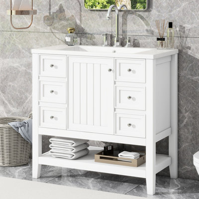 Meuble-lavabo de 36 po en blanc avec lavabo en bois massif et céramique, une armoire, trois tiroirs, finition peinte, autoportant, assemblage sous le comptoir requis, couleur blanche, abattant en peuplier / caoutchouc