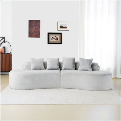 Modern And Simple Curved Flannelette Sofa, Creative Multi-Seater I With Pillows For Comfortable Living Room Seating.