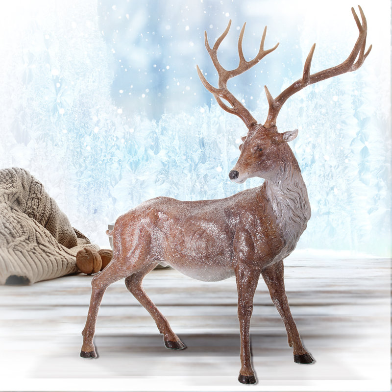 Cerf debout givré