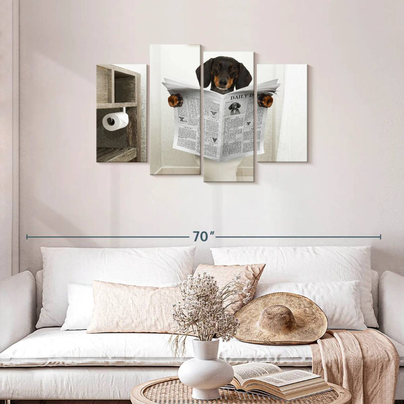 Ketti teckel lisant un journal, H 27 po x l 43 po
