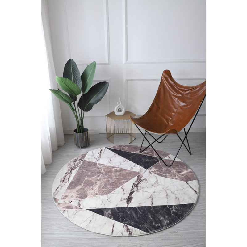 Tapis brun Telesphoros, Rond 5 pi
