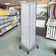 Three-Sided Revolving Pegboard Tower Floor Display on Wheeled Metal Base. Spinner Rack Stand. Panel Size: 16"W x 60"H