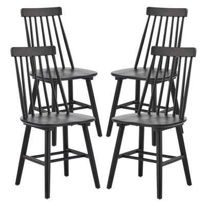 Ensemble de quatre chaises d'appoint à dossier Windsor en bois massif noir