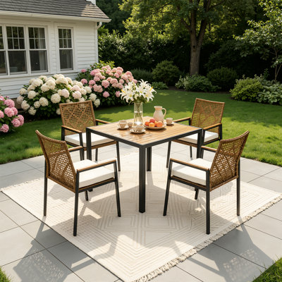 Ensemble repas 5 pièces avec plateau en bois d'acacia, chaises en rotin et trou pour parasol