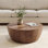Table basse ronde avec grain de bois naturel pour le salon