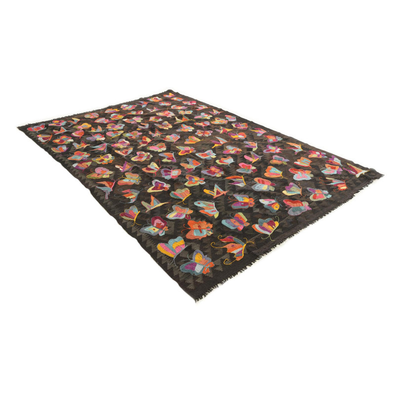 Tapis brun foncé Pelfrey