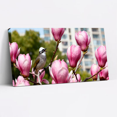 Ensemble de 1 tableau sur toile tendue représentant des fleurs de magnolia rose et un oiseau