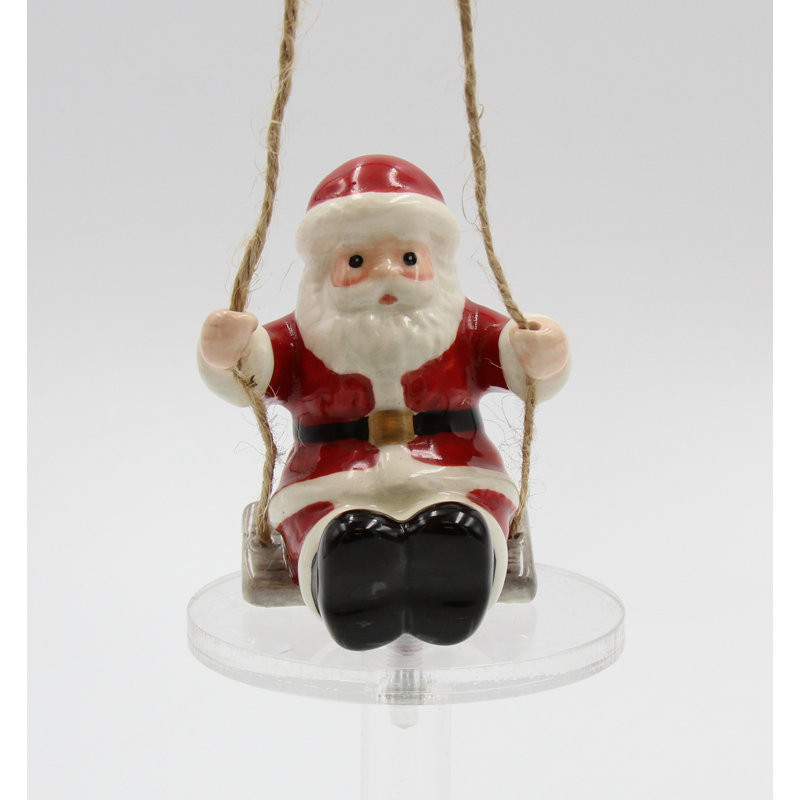 Ornement Père Noël sur une balançoire