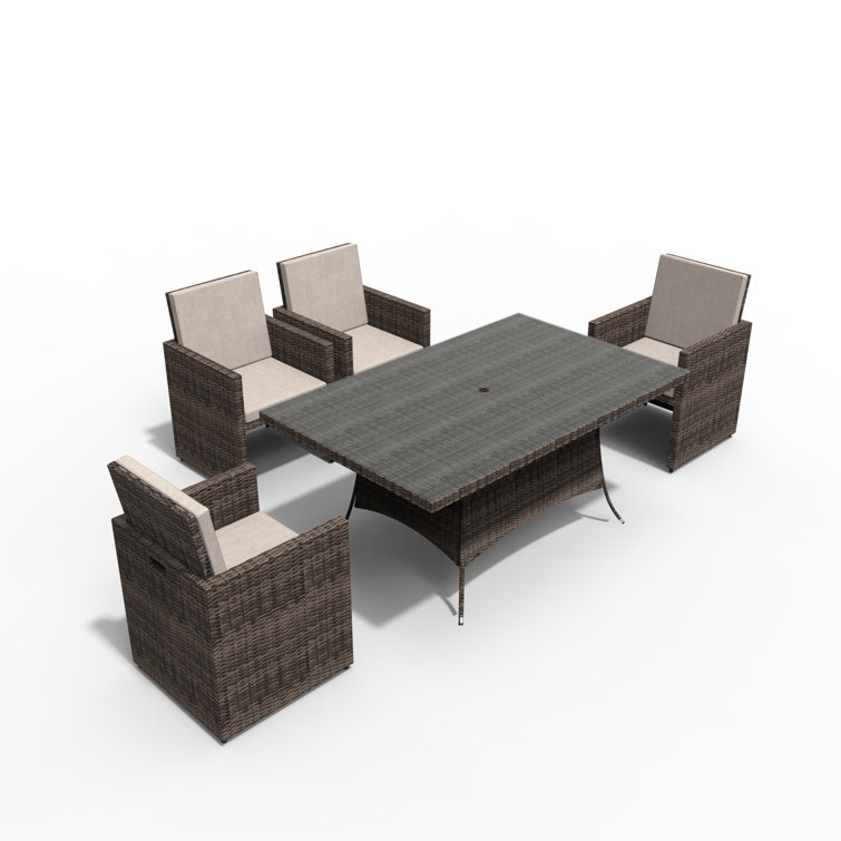 Rectangular 4 - Person 62.99" Long Dining Set with Cushions