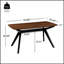 Table de salle à manger robuste en bois d'hévéa avec une finition noyer élégante et noire, parfaite pour les réunions de famille et les dîners.