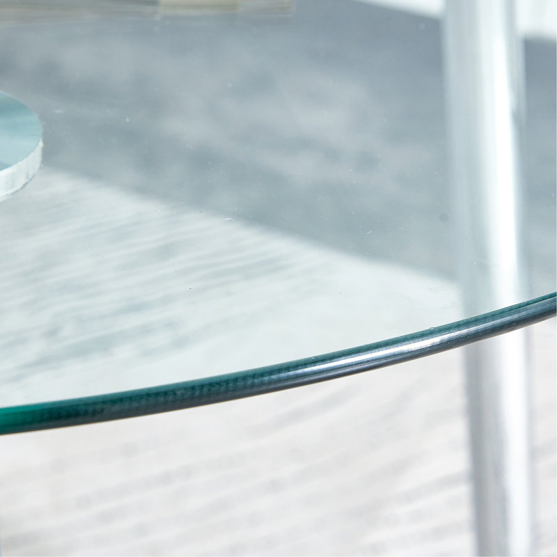 Un plateau de table en verre d'un diamètre de 40 pouces et une table de salle à manger circulaire minimaliste moderne avec des pieds en métal argenté. Convient pour les salons et les salles de conférence