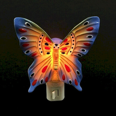 Veilleuse bleue en forme de papillon