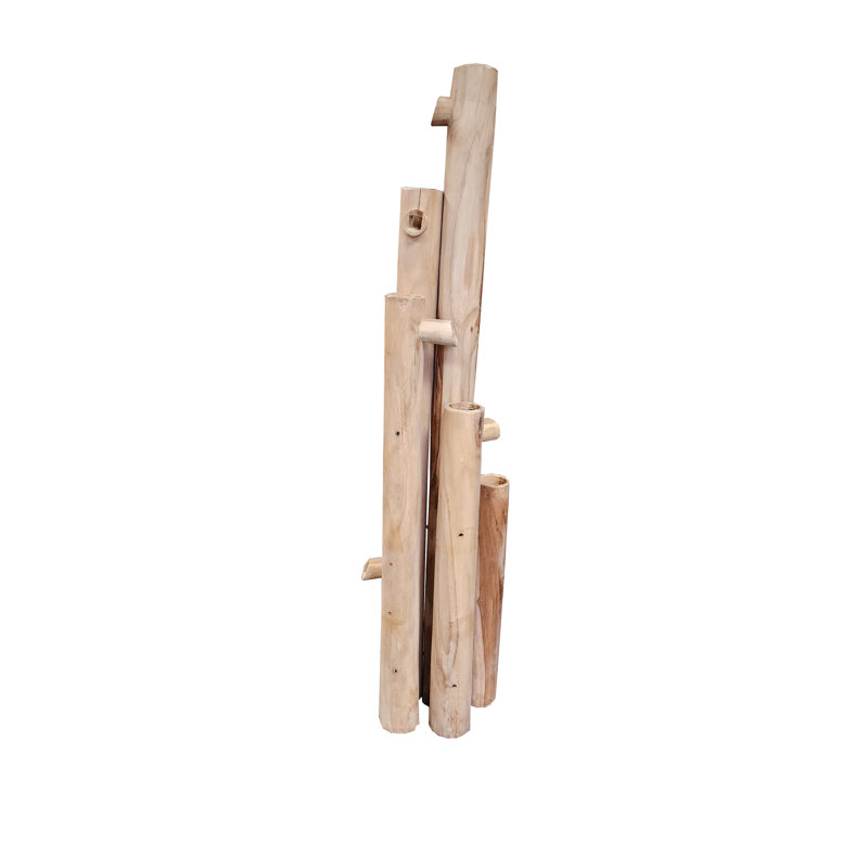 Debarked Teak log poles dripping water fountain